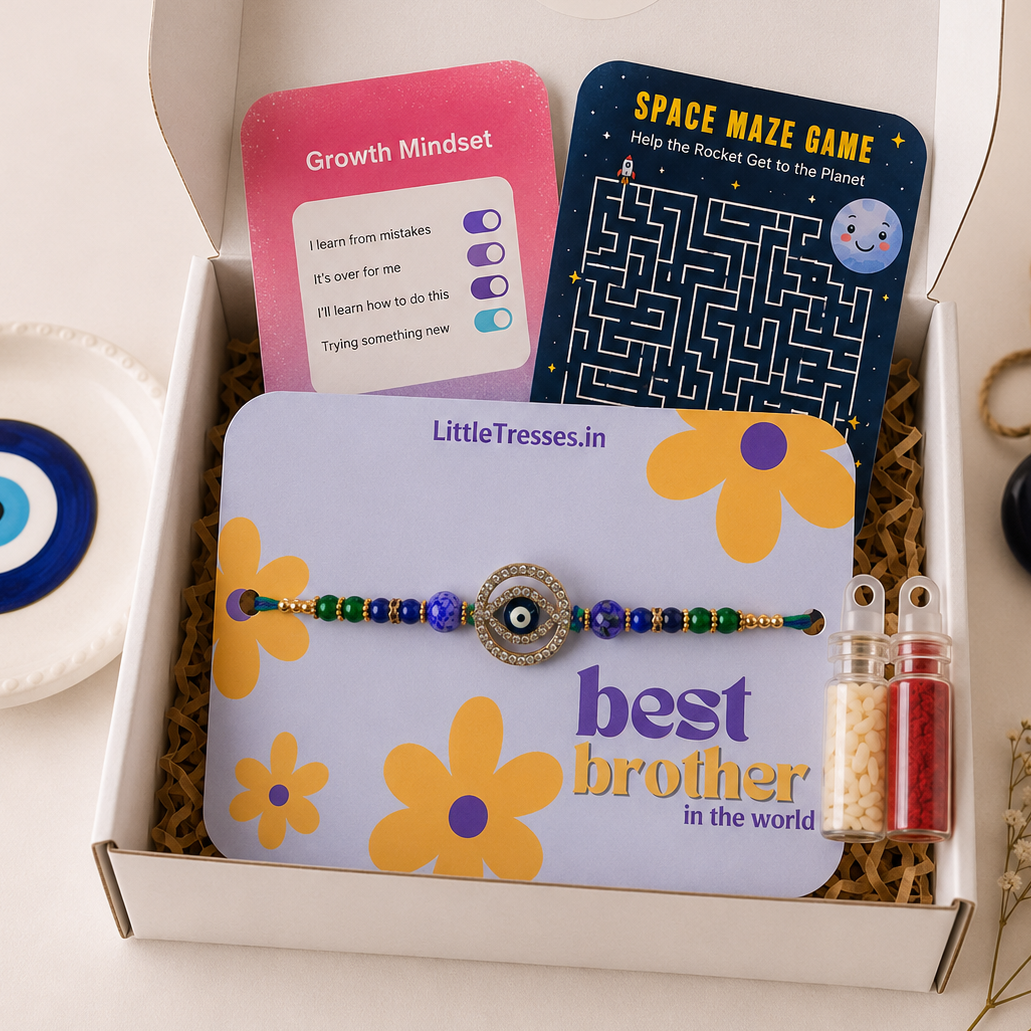 Celebrate Raksha Bandhan with the Little Tresses Blue Evil Eye Rakhi Gift Box. Includes a premium Blue Evil Eye Rakhi, activity cards, greeting card, roli bottle and rice bottle in a beautifully packaged gift box.