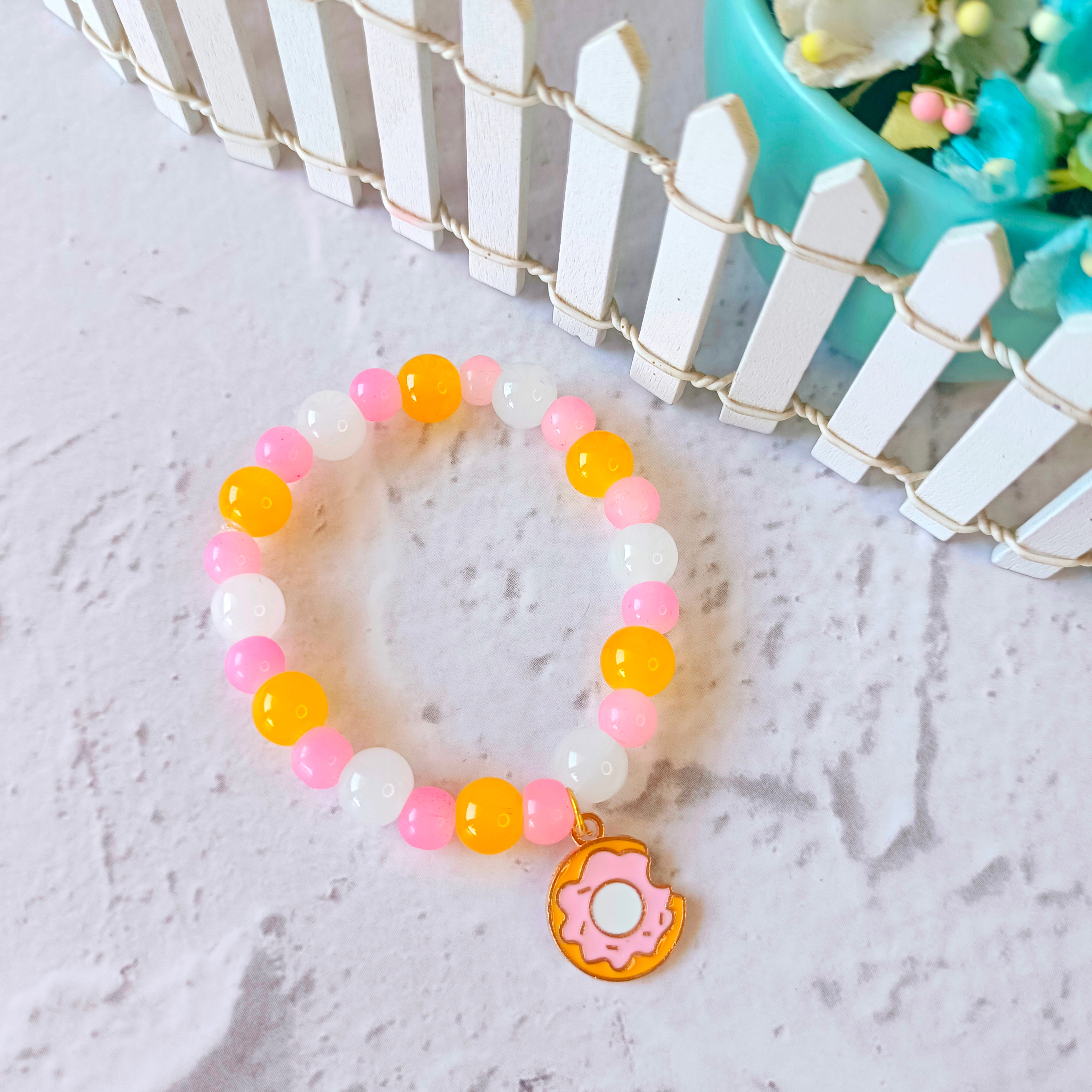 #KidsCharmBracelets #CharmBraceletsForKids #CustomKidsJewelry #CuteKidsBracelets #SweetAccessoriesForKids #DonutJewelry#PersonalizedCharmBracelets #KidsJewelryTrends #GiftForKids #BraceletsForChildren #KidsJewelry #HandmadeKidsBracelets #UniqueBraceletsForKids #BirthdayGiftsForKids #CustomizableBracelets #GirlsCharmBracelets #KidsFashionAccessories #Food #FoodAccessories #Donut #DonutCharm #FoodCharm #DonutBracelet #DonutCharmBracelet