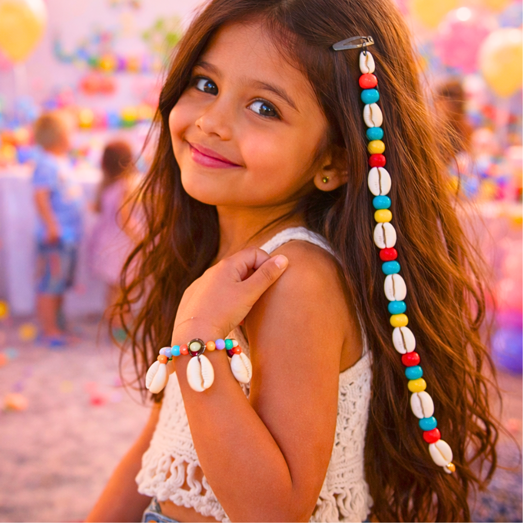 Girl wearing cowrie shell snap hair clip with multicolor wooden bead bracelet set for beach and boho styling