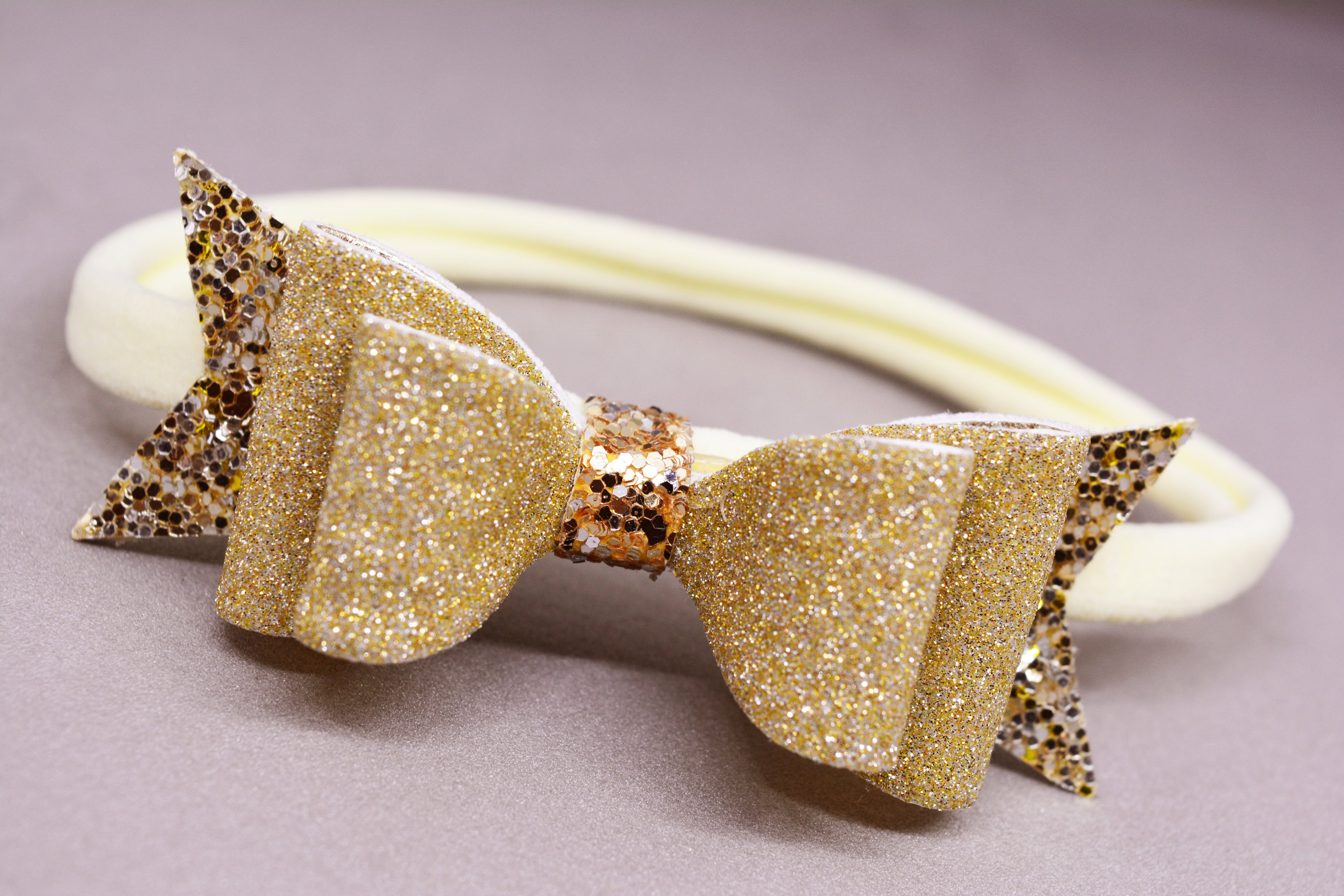 Shimmer Bow with Arrow Soft Stretchable Headband - Golden