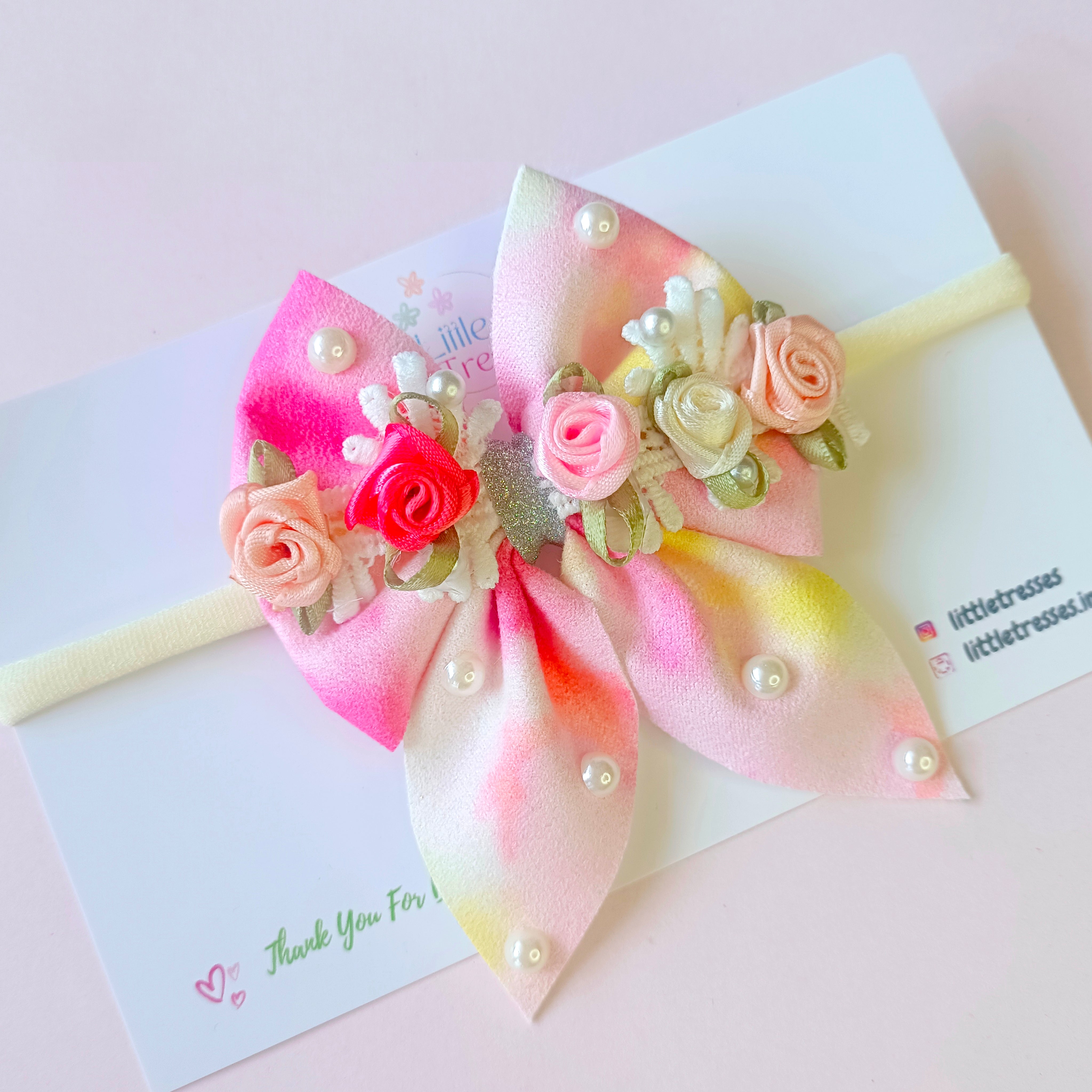 Infant soft headband with pastel bow and floral lace