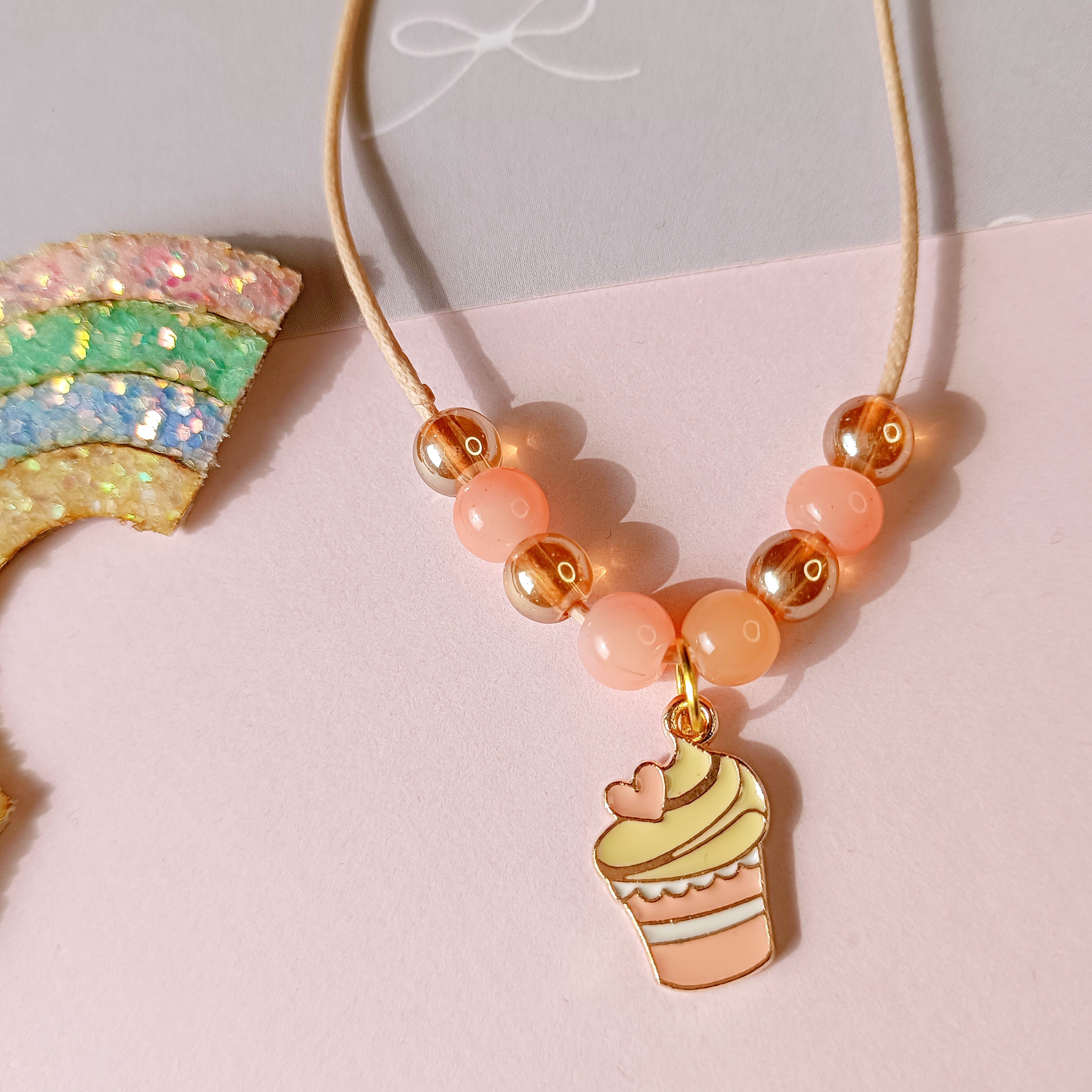 Cup Cake with Heart Pendant