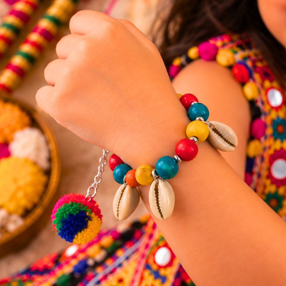 Navratri Kaudi and dangling pompom bracelet with colourful beads for kids