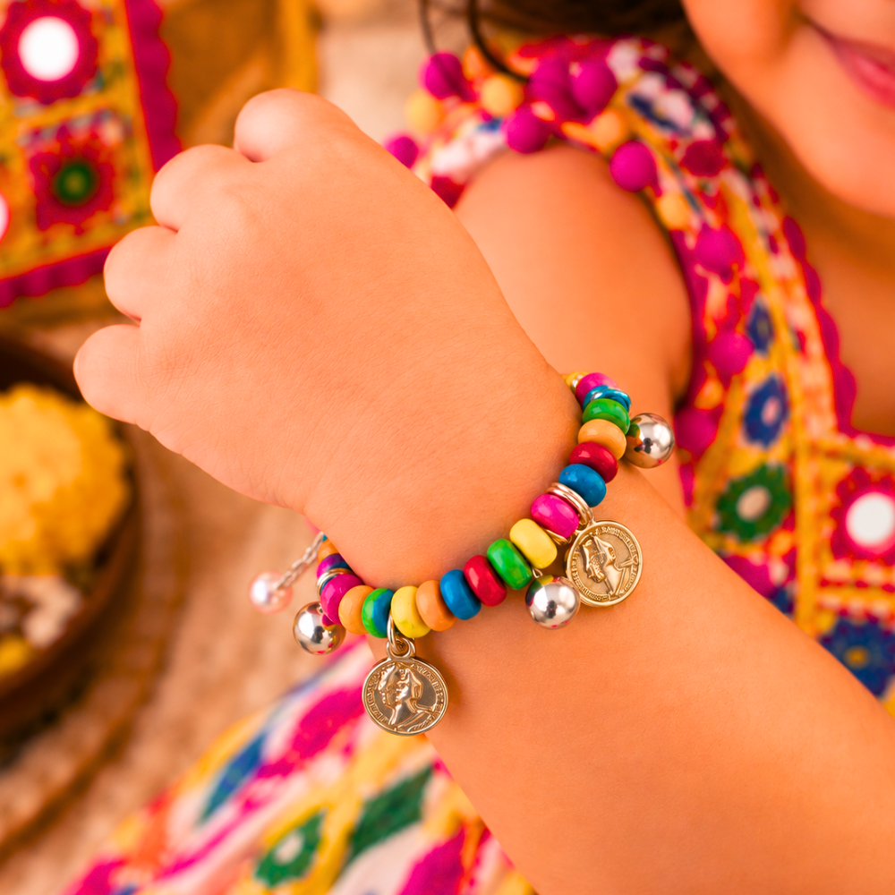 Navratri Sikka and Ghunghroo adjustable bracelet with colourful beads for kids