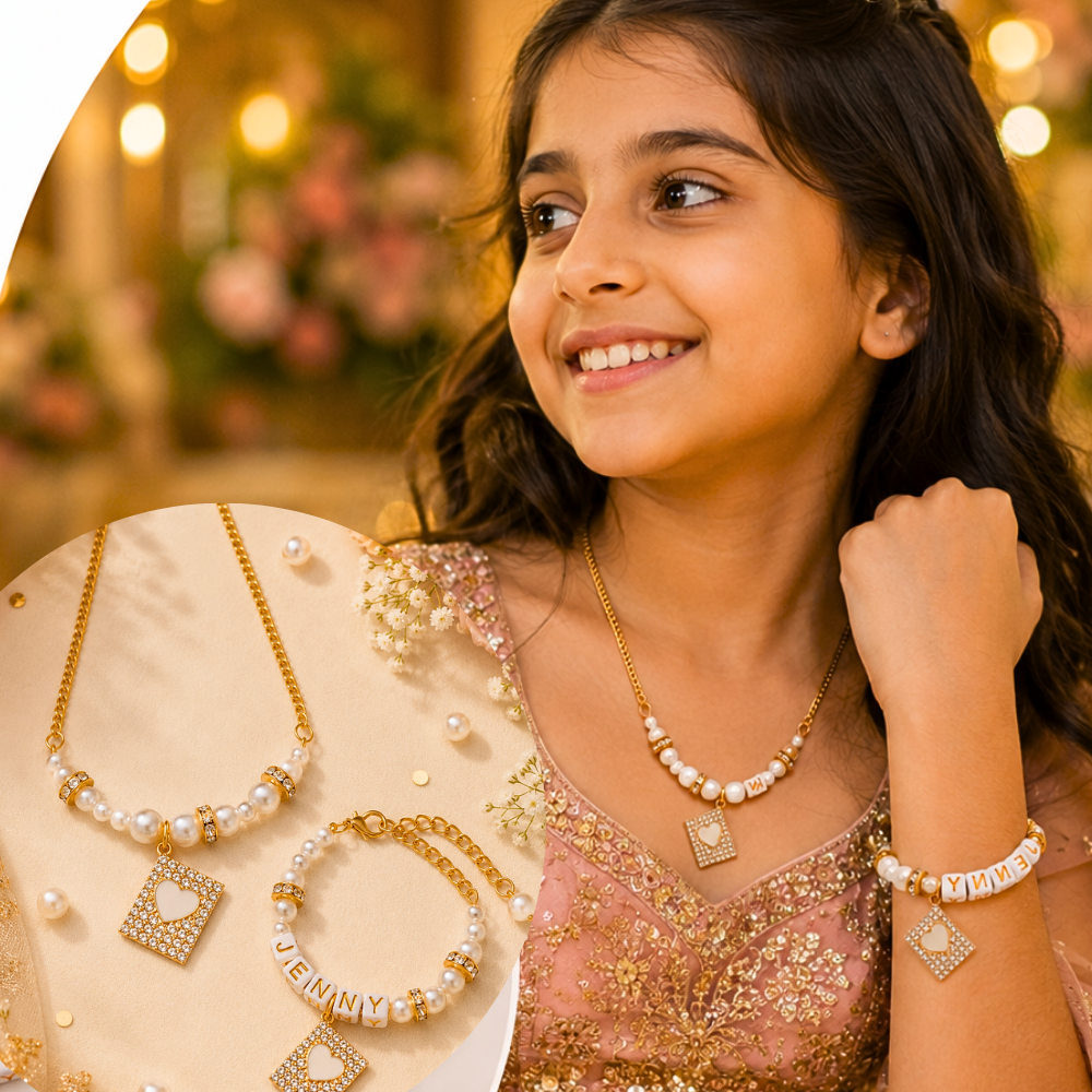 Personalized bling heart necklace and name bracelet set for girls.