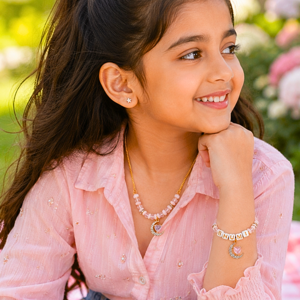 Personalized heart and crescent moon necklace and name bracelet set for girls.