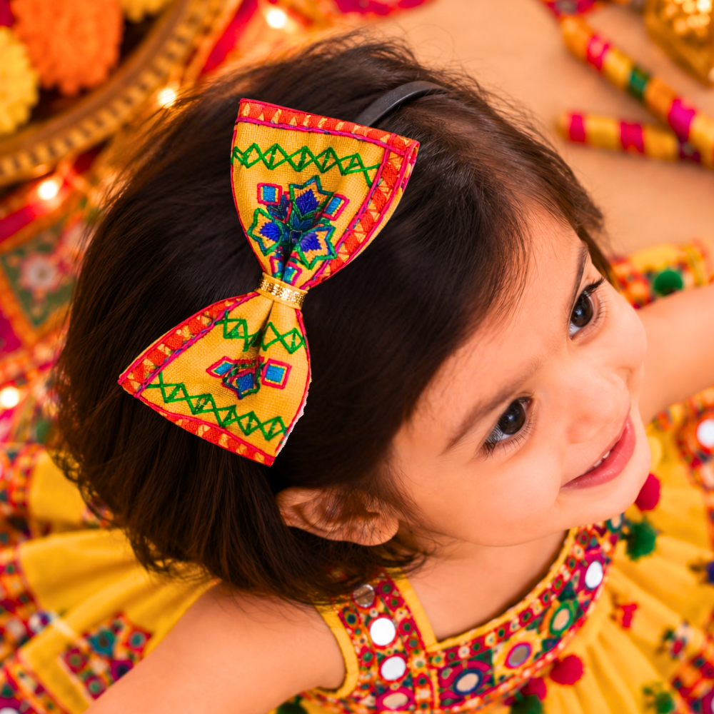 Rangeela yellow embroidered Navratri headband for girls with colourful traditional detailing