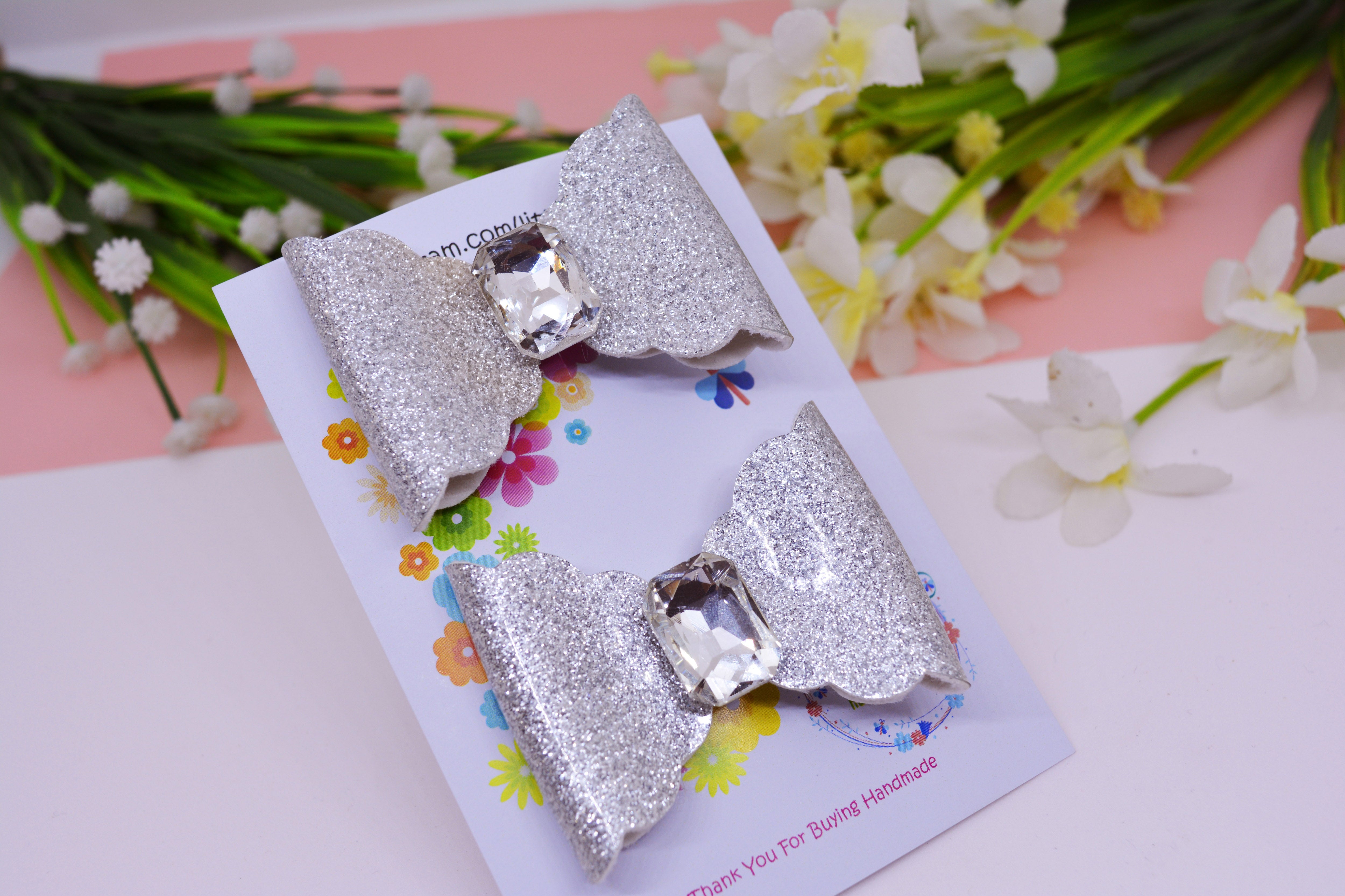 Scalloped Bow with big Rhinestone center Pair -Silver